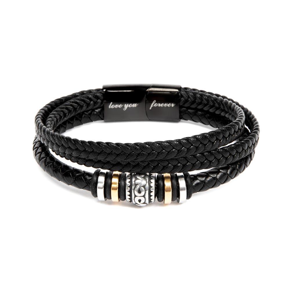 The "Love You Forever Bracelet" by Divine Dispatch is crafted from black braided leather, accented with silver and gold details, and features a clasp engraved with "love you forever.