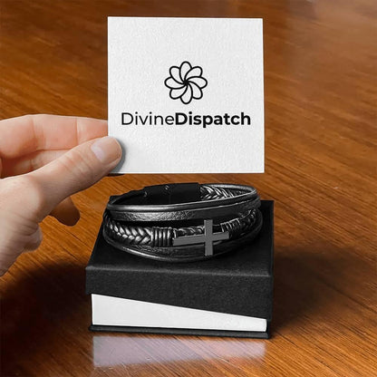 A hand holds a card displaying the Divine Dispatch logo above a Men&