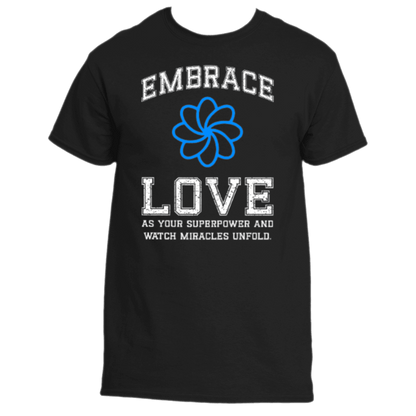 Discover the Embrace Love T-Shirt by Divine Dispatch, crafted from premium black fabric and adorned with an inspiring message: &quot;Embrace Love as your superpower and watch miracles unfold,&quot; accentuated by a striking blue spiral design.