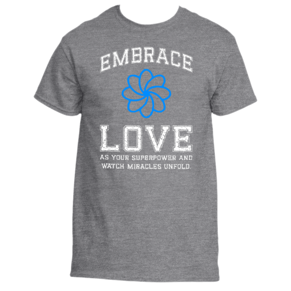 The Embrace Love T-Shirt by Divine Dispatch is a premium fabric top, showcasing white text that reads &quot;Embrace Love&quot; above and &quot;As your superpower and watch miracles unfold&quot; below a blue flower design.