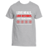 Ash grey Love Heals T-Shirt by Divine Dispatch, displaying the inspiring mantra "Love heals, Love restores, Love transforms" in sharp white and striking red lettering. It includes four vivid red flower graphics, ideal for conveying the themes of healing and transformation.