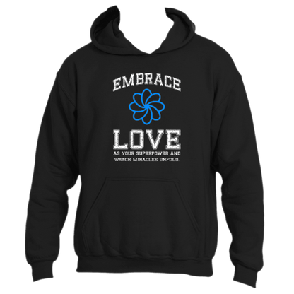 Embrace the &quot;Embrace Love&quot; hoodie by Divine Dispatch. This black hoodie, made from premium fabric, showcases an inspiring message alongside a blue flower design: &quot;As your superpower and watch miracles unfold.