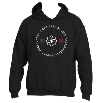 The Love Deeply Hoodie by Divine Dispatch is a black hoodie made from premium fabric, featuring a white flower, red numbers &quot;20&quot; and &quot;23,&quot; alongside the phrase &quot;Love Deeply. Live Passionately. Impact Profoundly.&quot; It makes a bold fashion statement of both love and style.