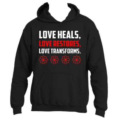 Introducing the Love Heals Hoodie by Divine Dispatch – a striking black hoodie adorned with the powerful message &quot;LOVE HEALS, LOVE RESTORES, LOVE TRANSFORMS&quot; in bold white and red lettering. This design celebrates the transformative power of love and is beautifully accented by four red flower symbols beneath its compelling message. Wear this expressive love clothing that truly speaks volumes.