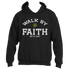 The Walk by Faith Hoodie by Divine Dispatch showcases a striking four-leaf clover graphic and the uplifting message "Walk by Faith, Not by Sight," expertly combining spirituality with style on a black fabric.